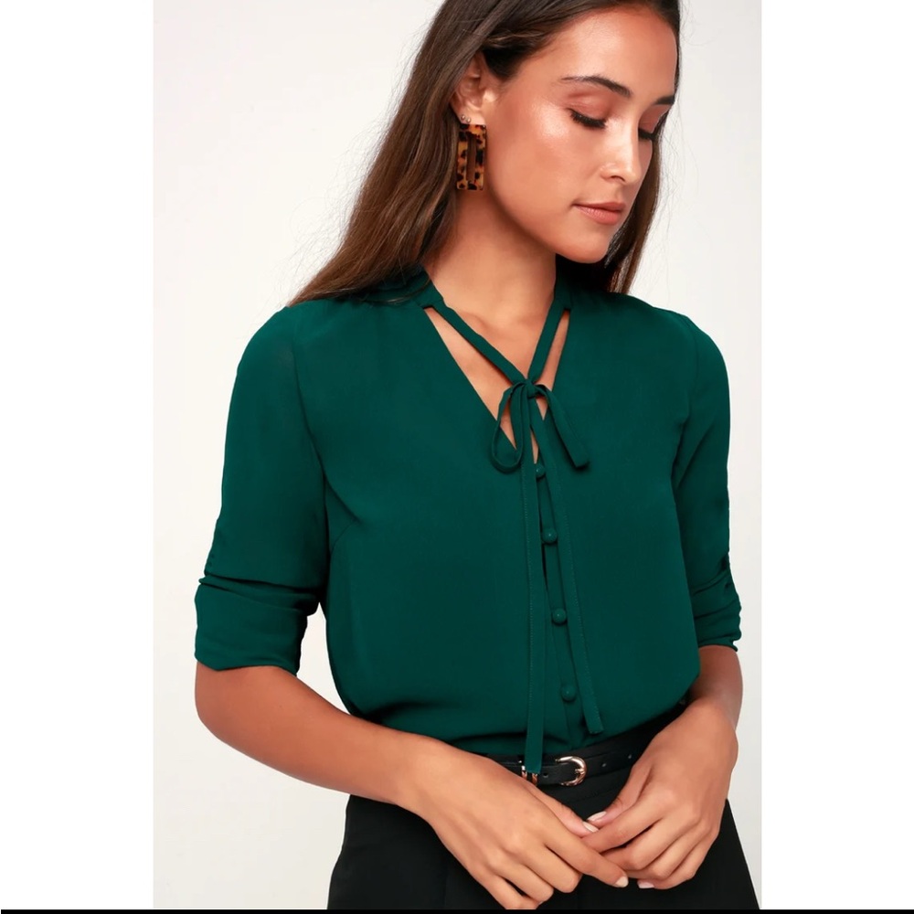 Lulu’s dark green blouse